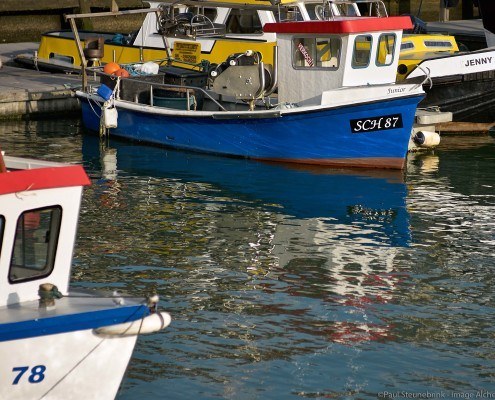 small blue boat, positive Clarity