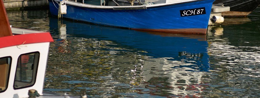 small blue boat, positive Clarity