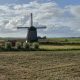 old windmill with grassland